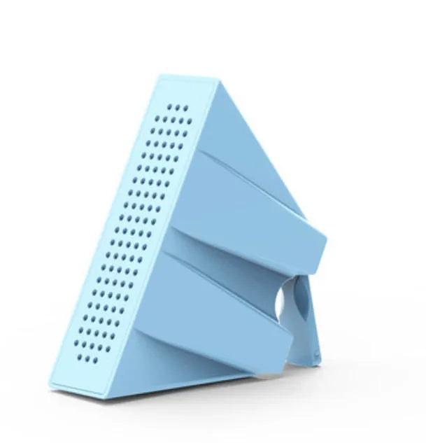 Portable black ABS plastic phone amplifier bracket holding a smartphone on a desk.