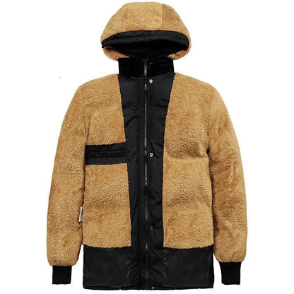 Man wearing a black velvet double-breasted padded winter jacket with a hood.