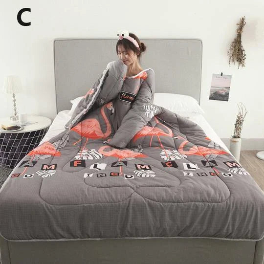 Cozy fleece blanket with sleeves in various colors, perfect for relaxing and enjoying indoor activities