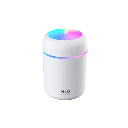 Compact USB car humidifier with colourful LED light and 300ml water tank for vehicle use
