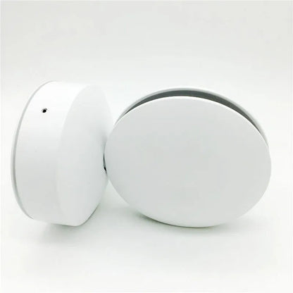 Aluminium and glass LED wall spotlight bar with colour change options, mounted on a corridor wall.