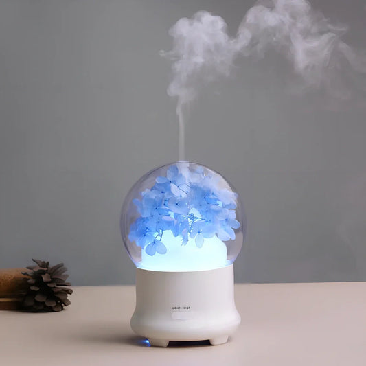 Blue hydrangea aromatherapy diffuser measuring 12x12x16.8cm with water reservoir and control buttons