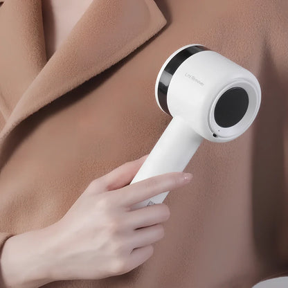 White rechargeable lint remover with detachable head and USB charging cable