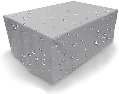 Waterproof furniture cover protecting outdoor table and chairs from rain with integrated storage bag