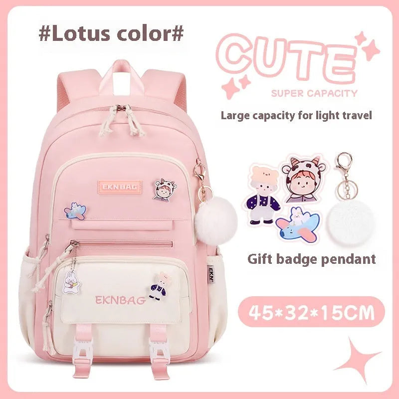 Pink waterproof Oxford cloth school backpack for girls with curved shoulder straps, shown with matching pencil case.