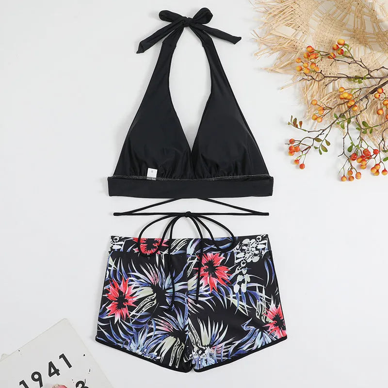High waist split bikini in peacock green, red, or black, nylon outer with polyester lining, sizes S to XL