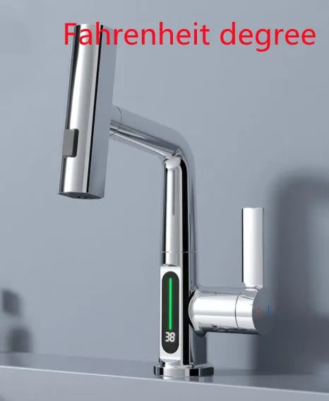 Modern digital display kitchen tap with pull-out spray hose showing LED temperature screen.
