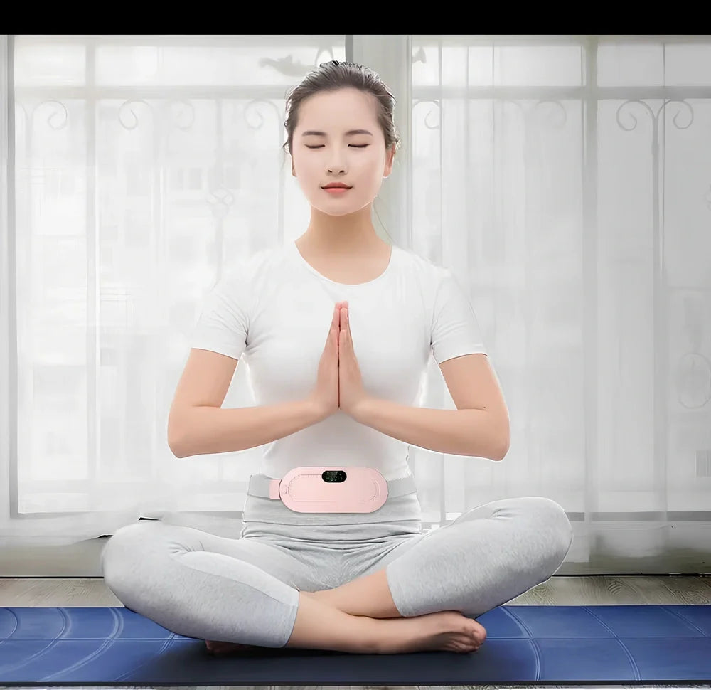 White electric heating belt with lumbar support showing USB connection and control buttons