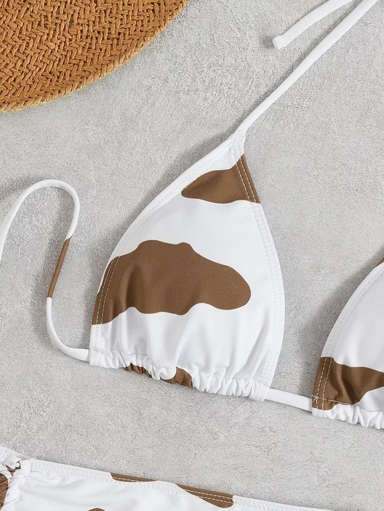 Women's cow print sleeveless swimsuit in coffee color, sizes S to 2XL