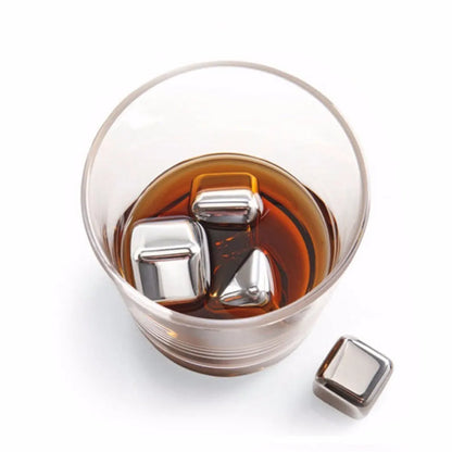 Set of eight stainless steel whiskey cooling stones with metal clip in plastic storage container