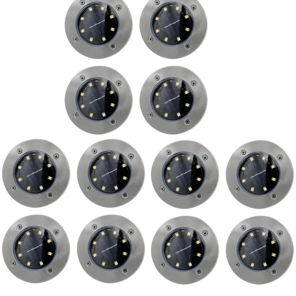 Stainless steel solar garden light with LED illumination for outdoor landscape lighting