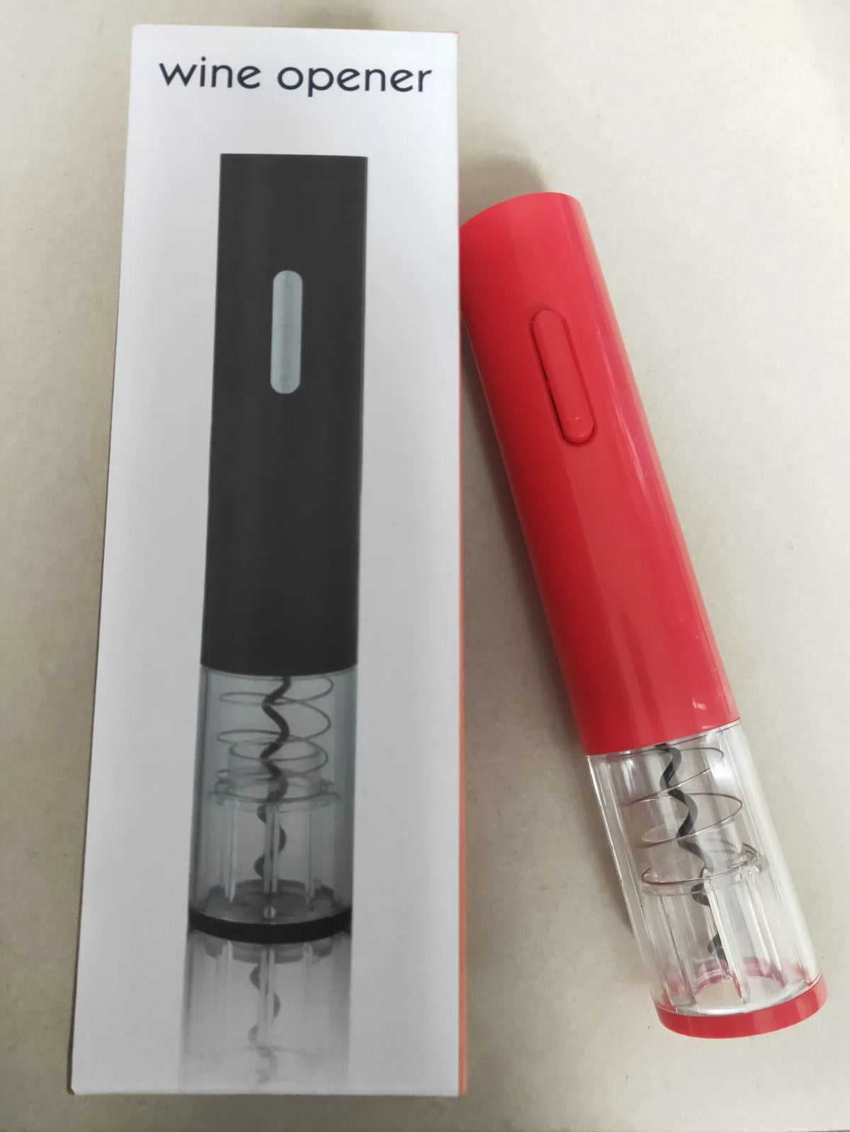 Automatic electric wine bottle opener with foil cutter in black, red, or white.