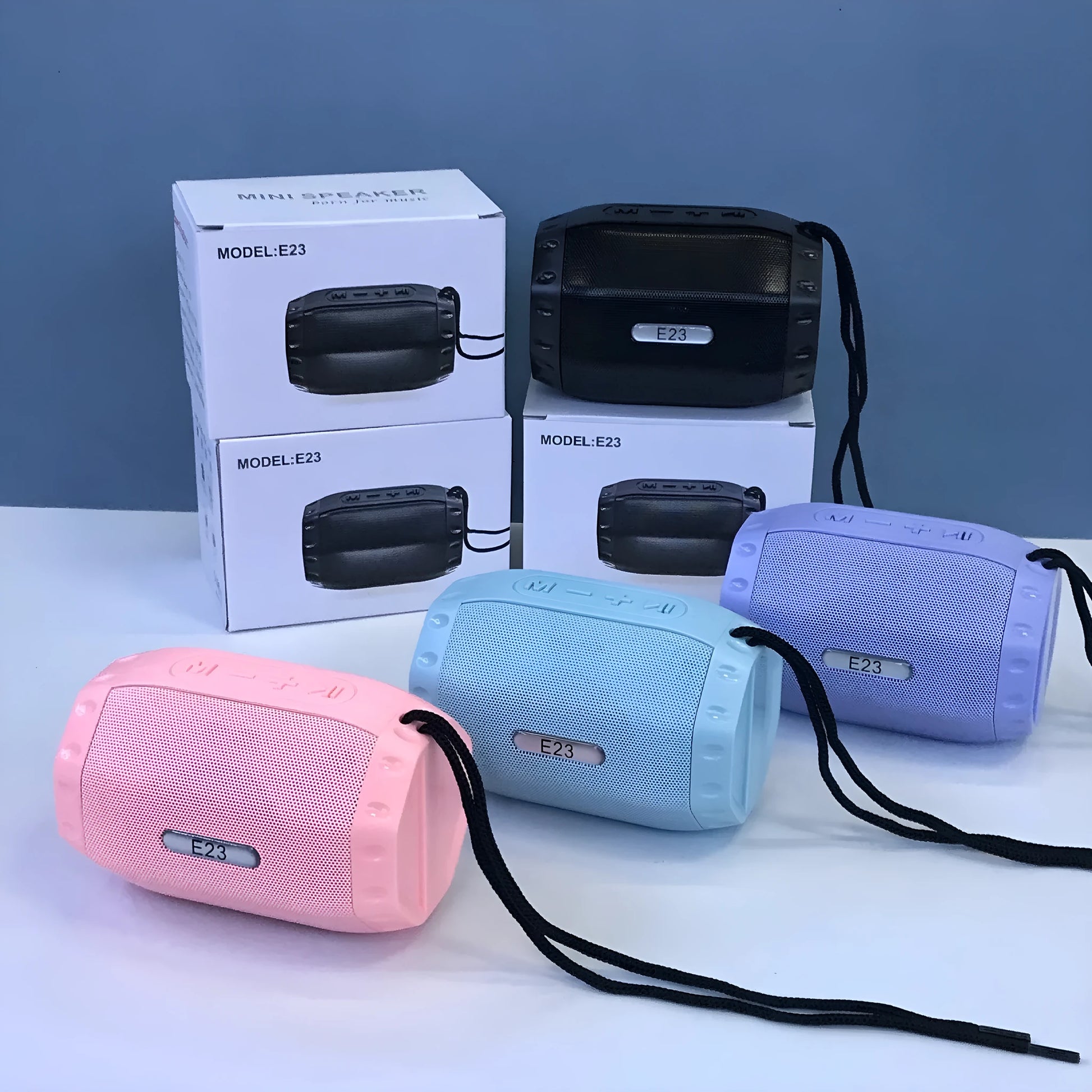 Small wireless USB card Bluetooth speaker in black, blue, pink, or purple colour options