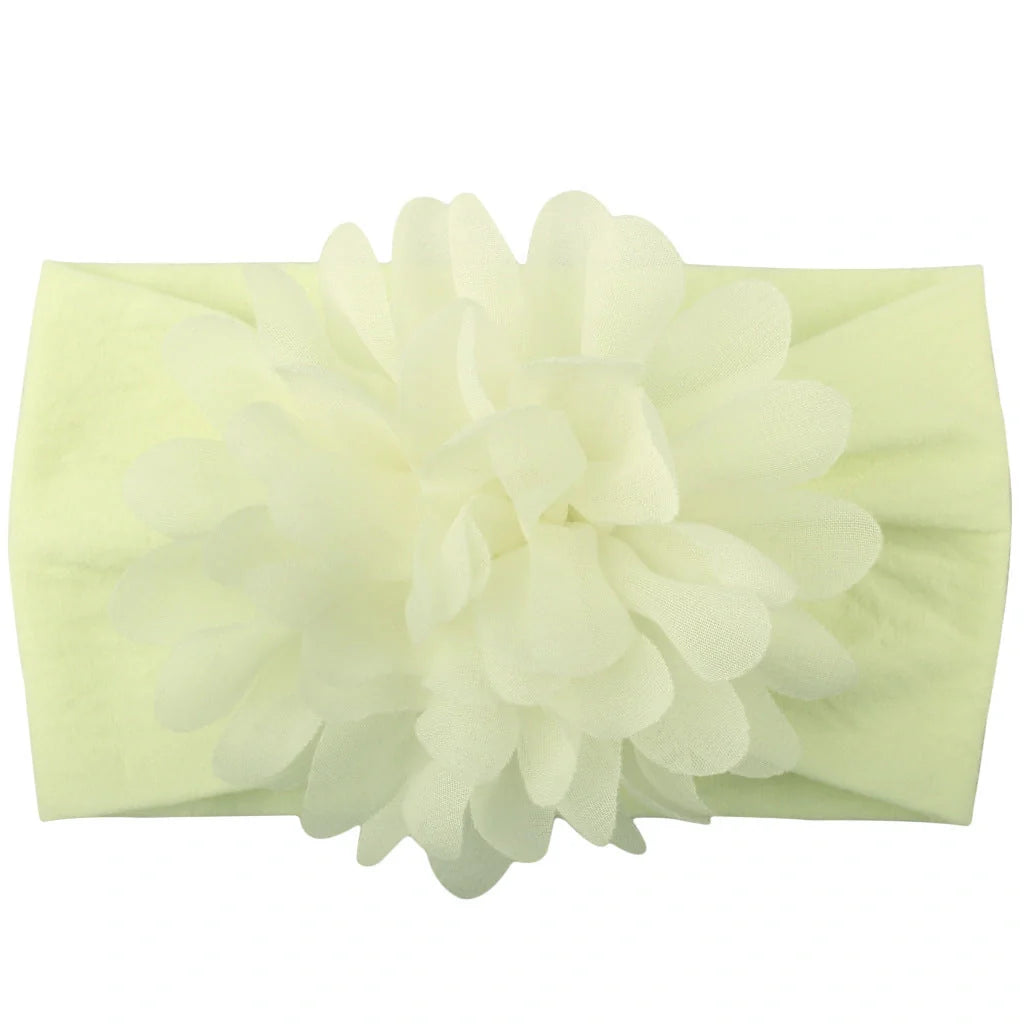 Adorable chiffon flower baby headband for your little princess, available in multiple colors.