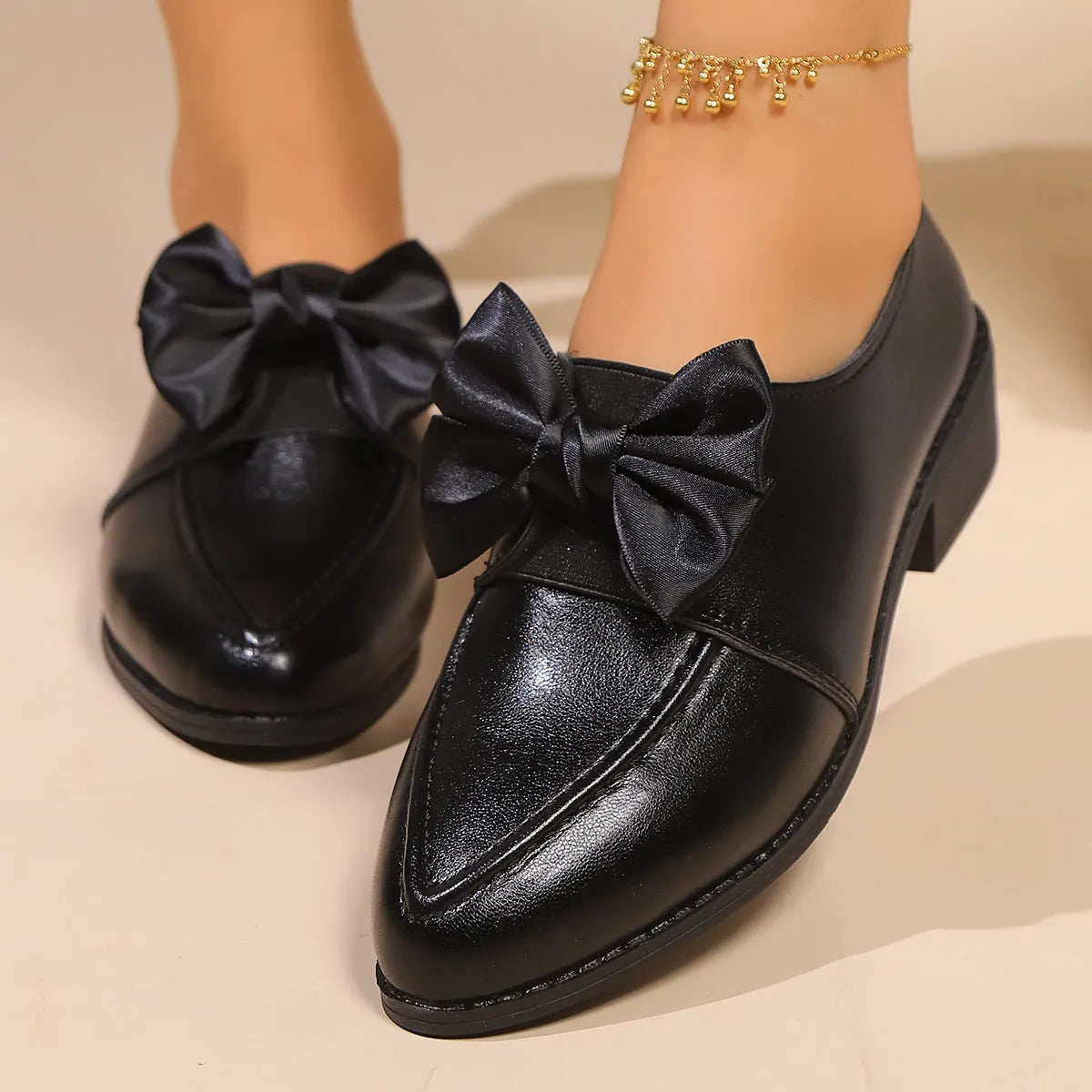 Women's British-style shoes with bow decoration, PU upper, and rubber sole in available sizes 36-43