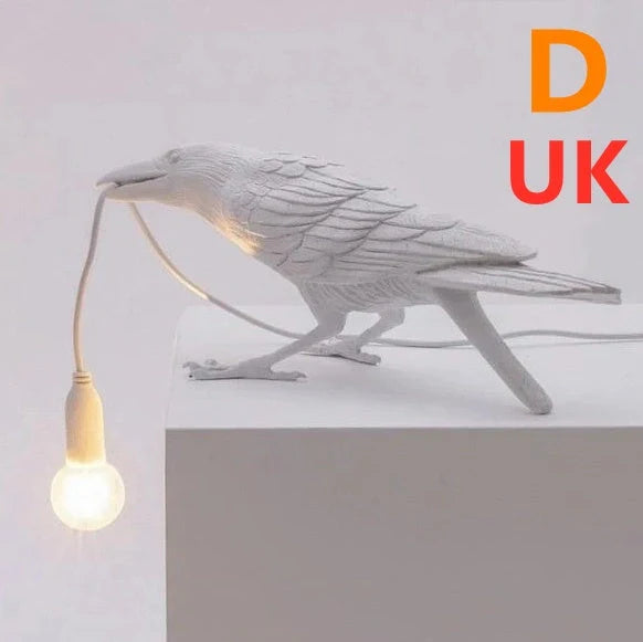 Elegant Resin Bird Wall Lamp illuminating a cozy room with its unique design
