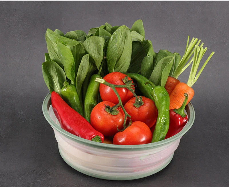 Collapsible microwave cover, colander, and fruit plate in various colors - a versatile kitchen accessory for cooking, draining, and serving