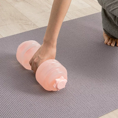 Mini Portable Plastic Water Dumbbell in transparent pink and light gray for adjustable resistance workouts