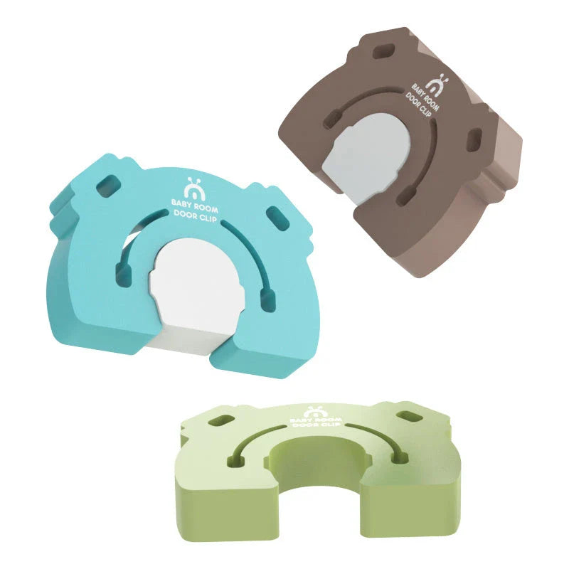 A colorful cartoon-style door stopper designed to keep babies and young children safe from pinched fingers and accidental door closures.