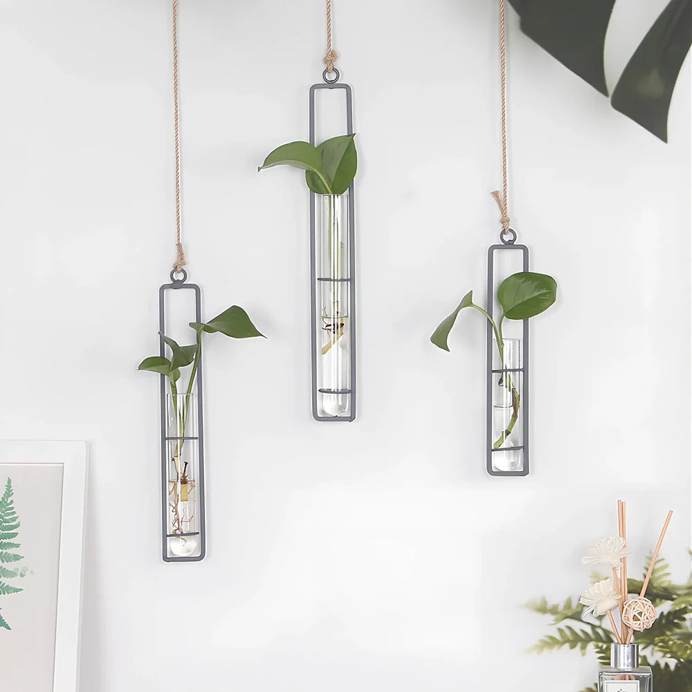 Grey wrought iron and glass hydroponic vase with hemp rope hanging three test tubes vertically