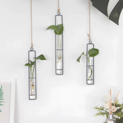 Grey wrought iron and glass hydroponic vase with hemp rope hanging three test tubes vertically