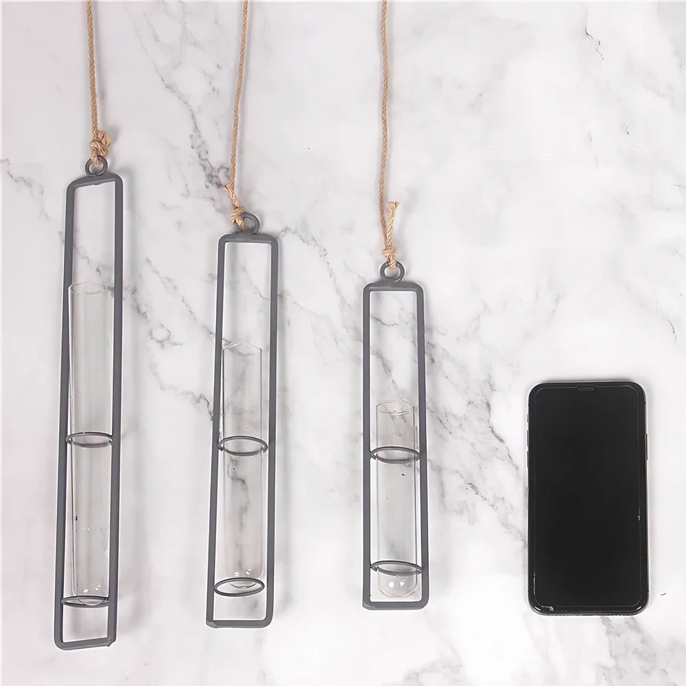 Grey wrought iron and glass hydroponic vase with hemp rope hanging three test tubes vertically
