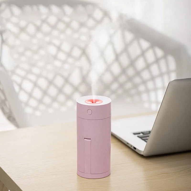 USB desktop humidifier with folding bracket, 5V portable air humidifier for office and car use, 320ml water tank capacity provides 6 hours continuous spray with white, pink or blue colour options