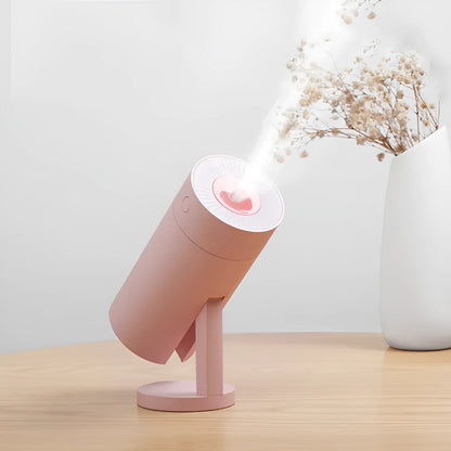 White USB desktop humidifier with folding bracket on wooden desk