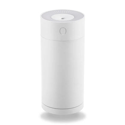 White USB desktop humidifier with folding bracket on wooden desk