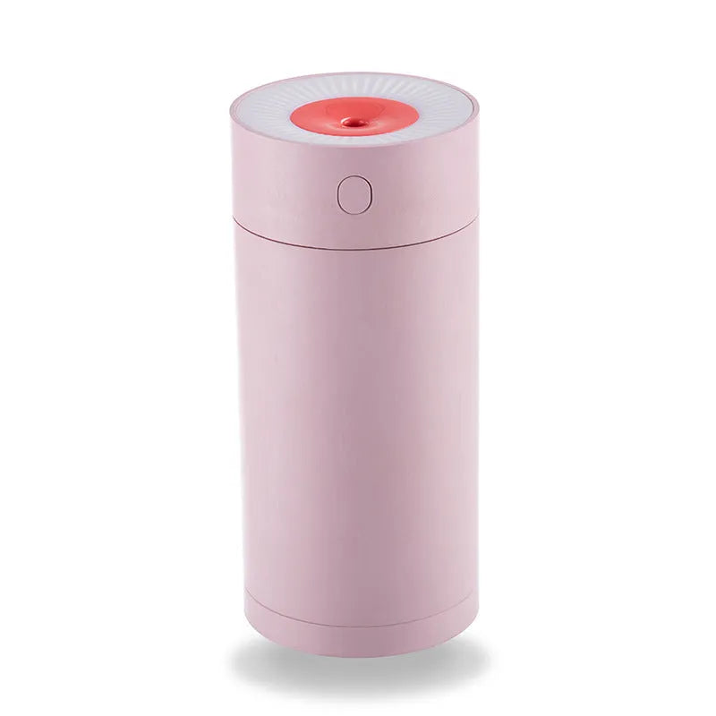 White USB desktop humidifier with folding bracket on wooden desk
