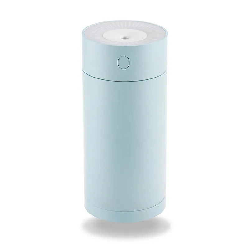 White USB desktop humidifier with folding bracket on wooden desk