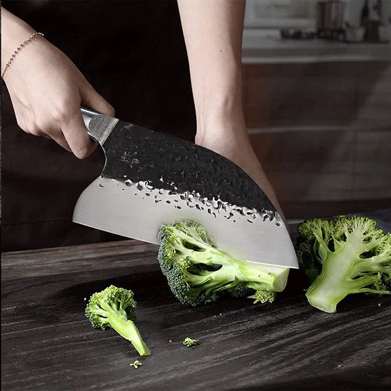 High chromium steel chef's knife with ebony wood handle for cutting meat and bones.