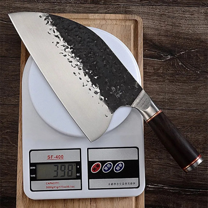 High chromium steel chef's knife with ebony wood handle for cutting meat and bones.