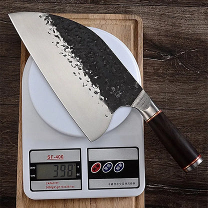 High chromium steel chef's knife with ebony wood handle for cutting meat and bones.
