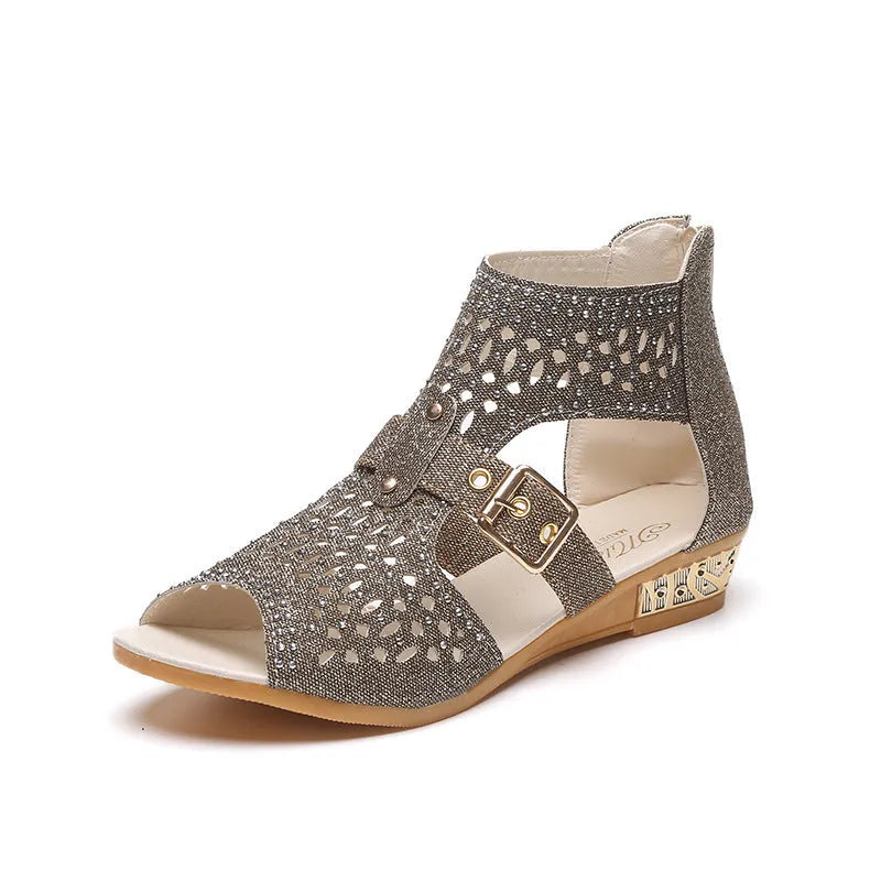 Women's flat sandals with back zipper, wedge heel, and fish mouth toe in beige, black, and gold colours