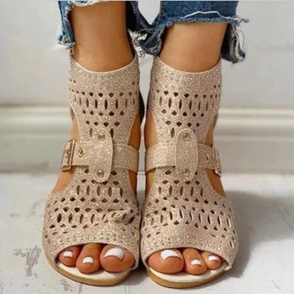 Women's flat sandals with back zipper, wedge heel, and fish mouth toe in beige, black, and gold colours