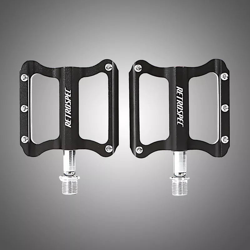 Lightweight aluminum mountain bike pedals with anti-skid nails and sealed bearings