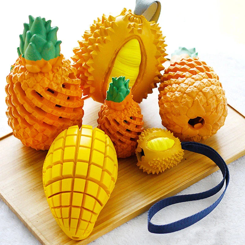 Fruit-shaped dog chew toy in vibrant colors for dental health and play