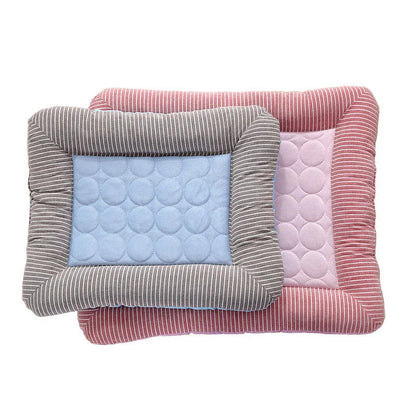 A plush, breathable cooling pet bed in blue and red colors, designed to keep dogs and cats comfortable in the summer heat.