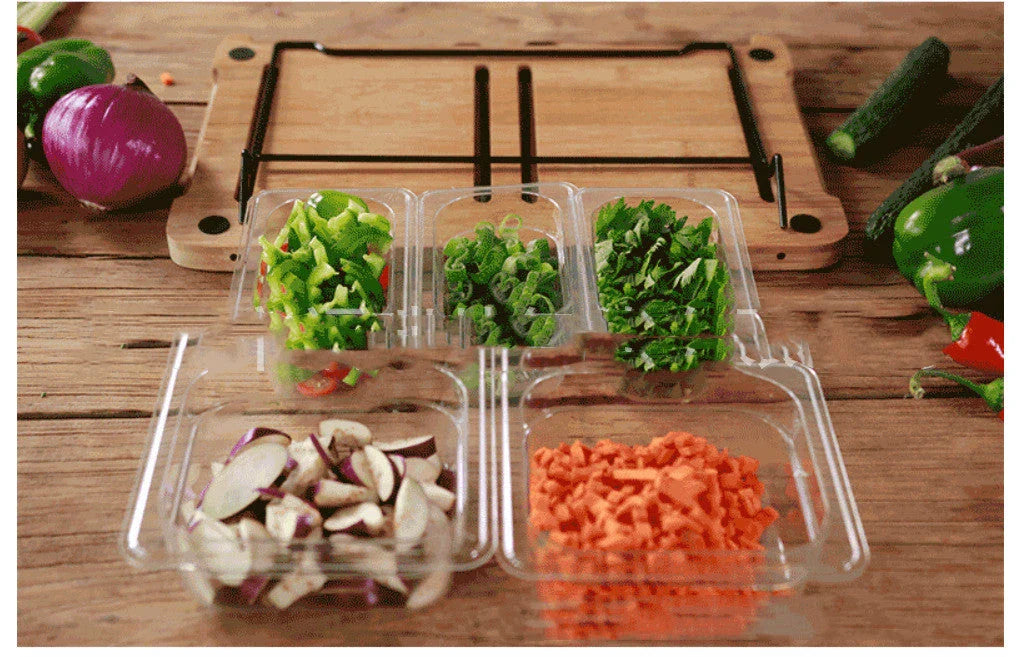 Bamboo cutting board with plastic storage trays for meal prep and organization