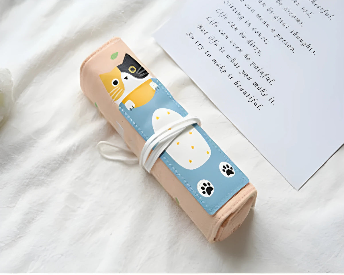 Korean-style rolling pencil case with cartoon cat print and zip, in blue, green, pink and yellow colours.