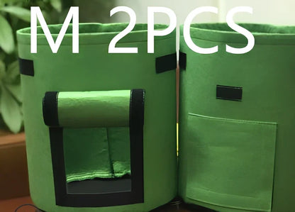 Black plant growth bag with side harvesting window and double handles for potato gardening