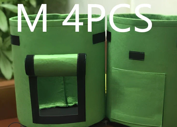 Black plant growth bag with side harvesting window and double handles for potato gardening