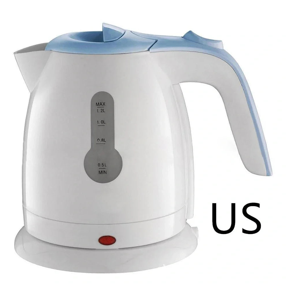 White electric travel kettle with scale window and 0.7m cord on 360-degree rotating base