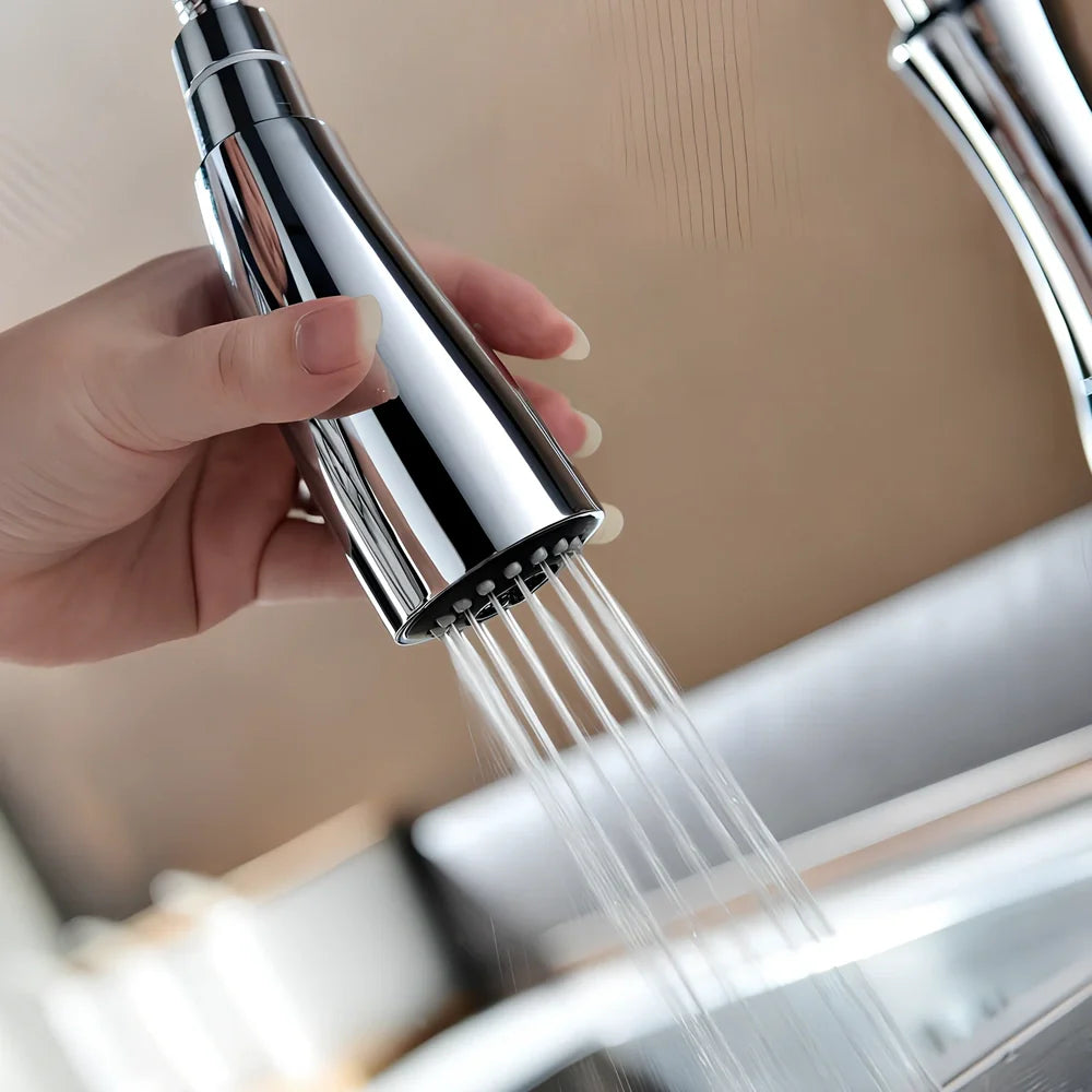 All copper rotatable pull-out kitchen faucet in silver with 50cm hose extension and single handle control