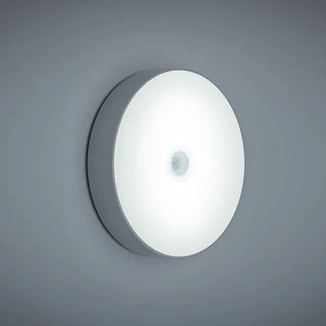 LED body sensing night light with USB charging, 86mm diameter, in beige or white, showing 3M tape for installation