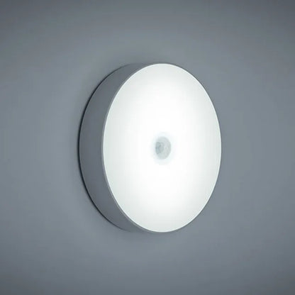LED body sensing night light with USB charging, 86mm diameter, in beige or white, showing 3M tape for installation