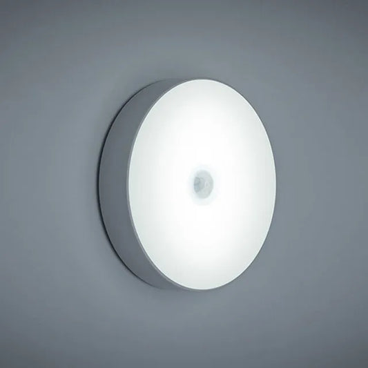 LED body sensing night light with USB charging, 86mm diameter, in beige or white, showing 3M tape for installation