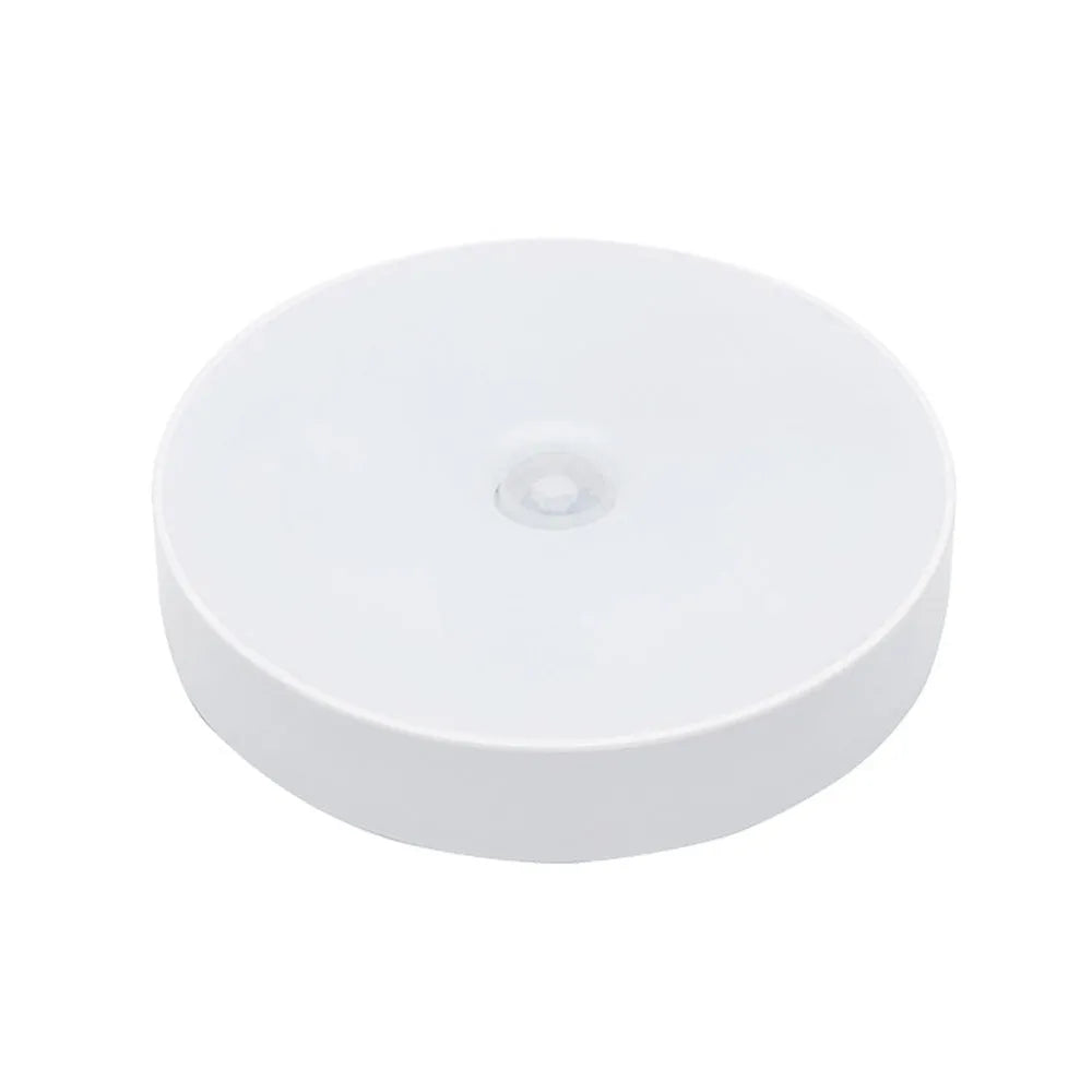 LED body sensing night light with USB charging, 86mm diameter, in beige or white, showing 3M tape for installation