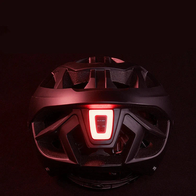 Rechargeable LED bicycle helmet in matt black, matt titanium, and pearl white with 9 lighting modes